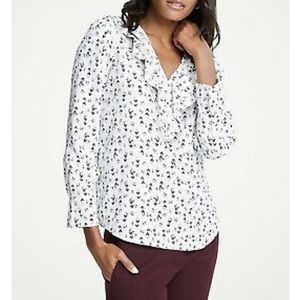 Ann Taylor floral ruffle blouse.